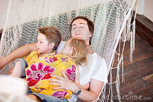 father-his-kids-relaxing-hammock-20037082